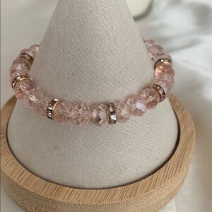 Elegant Pink Beaded Bracelet with Gold Angel Charm